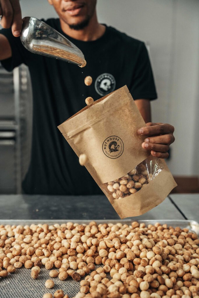 Nut House production team packaging nuts in Mahaai Curaçao